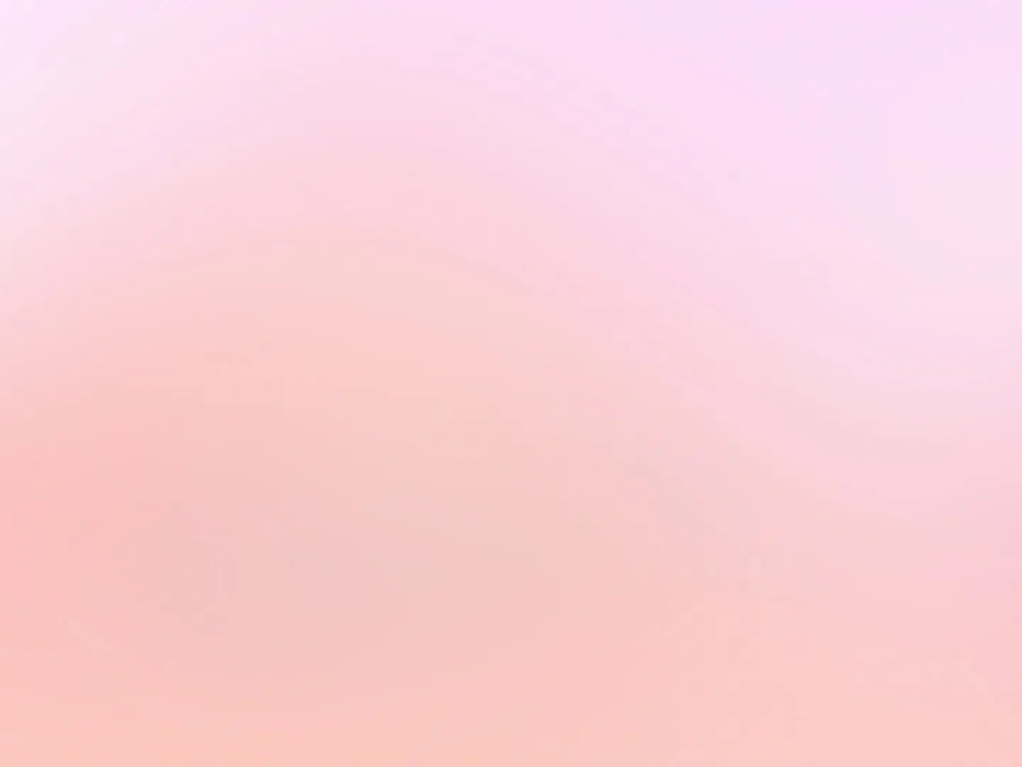 a blurry image of a pink and white background