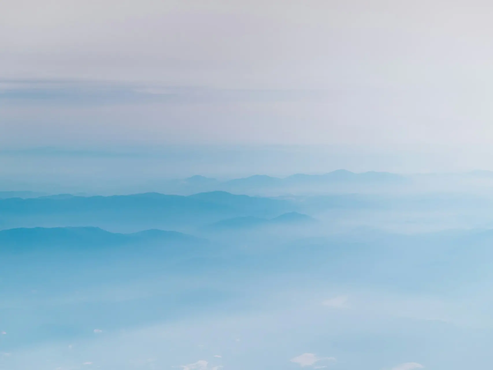 mountain covering with clouds